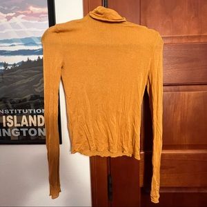 Out from under ribbed turtleneck